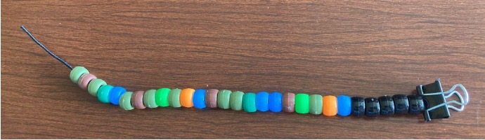 A completed bracelet showing the correct bead color ratios